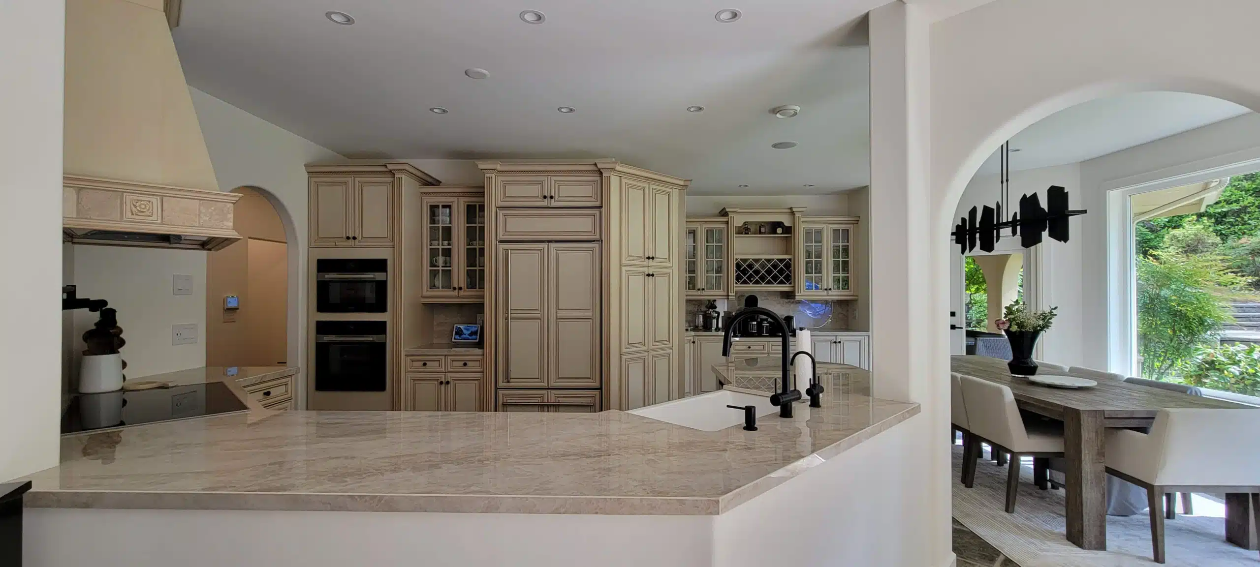 Modern Kitchen Renovation Services North Vancouver with stylish cabinets and island