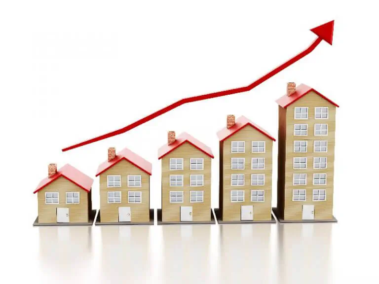 Model houses rising in size beside a growth chart